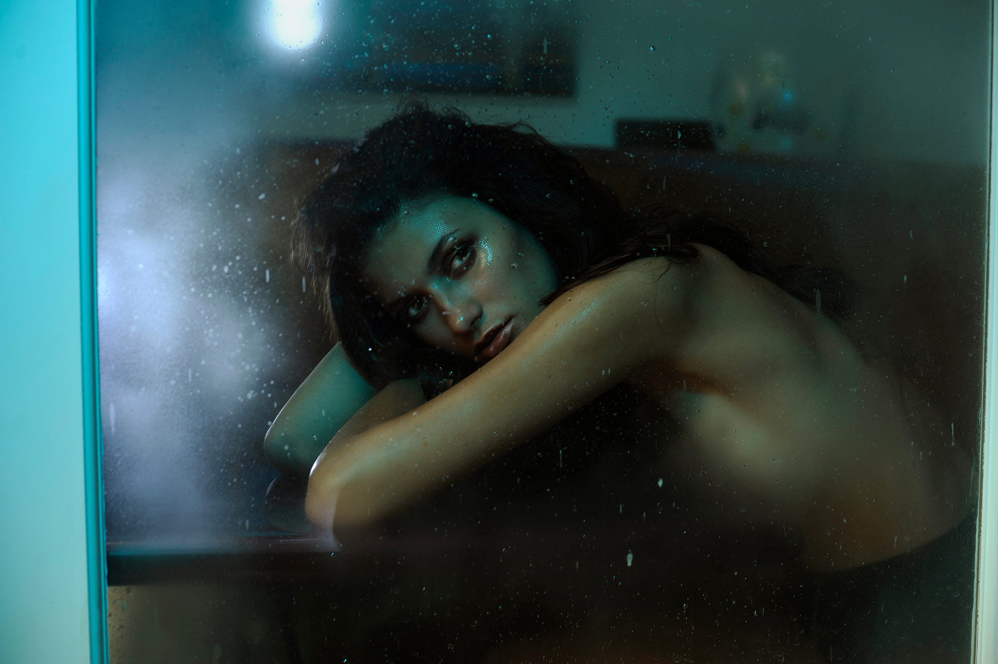 Just a moment behind the glass. When there is water or dirt on glass I think it intensifies the emotion. There is life in those droplets.
